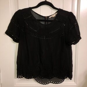 Eyelet short sleeve top size small color black